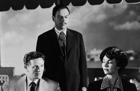 We Were Strangers!  A Classic Noir Film Exploring Themes of Identity and Deception